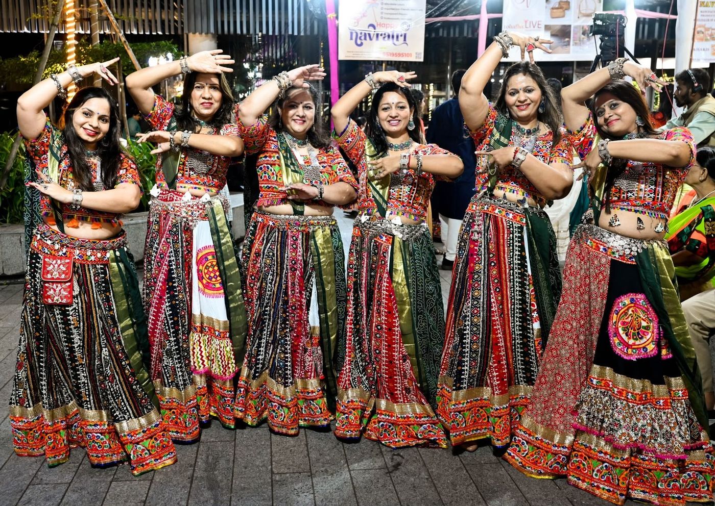 Ladies in traditional chaniya choli celebrating garba