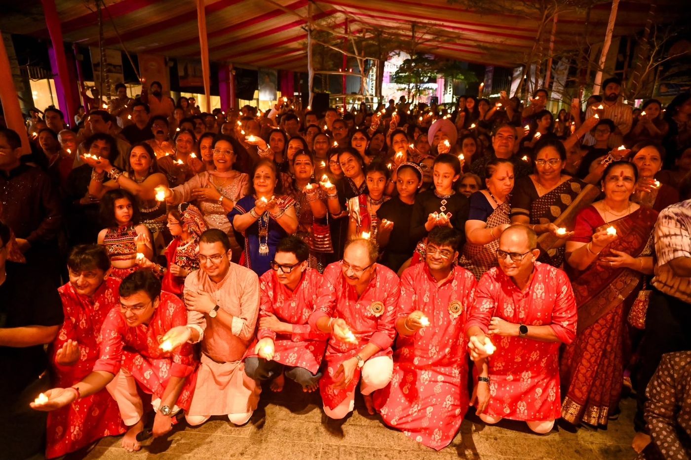 Community aarti with diyas